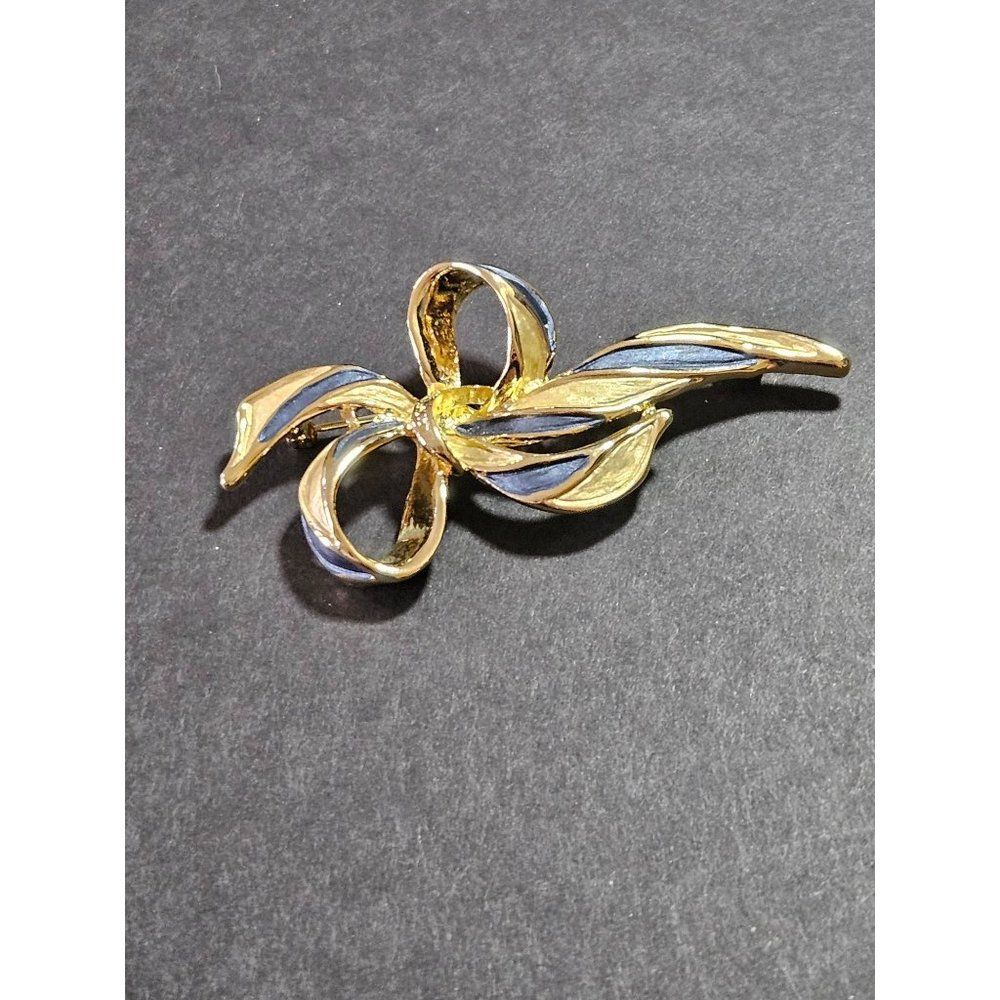 Vintage gold tone blue enamel bow brooch